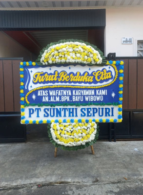 Papan Bunga Duka di Padang Bulan