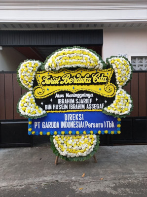 Papan Bunga Duka di Padang Bulan
